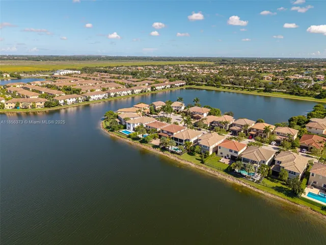 $1,310,000 | 9709 Blue Isle Bay, Parkland, FL 33076