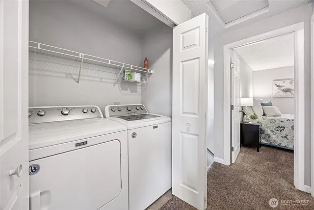 a view of utility room and bedroom view