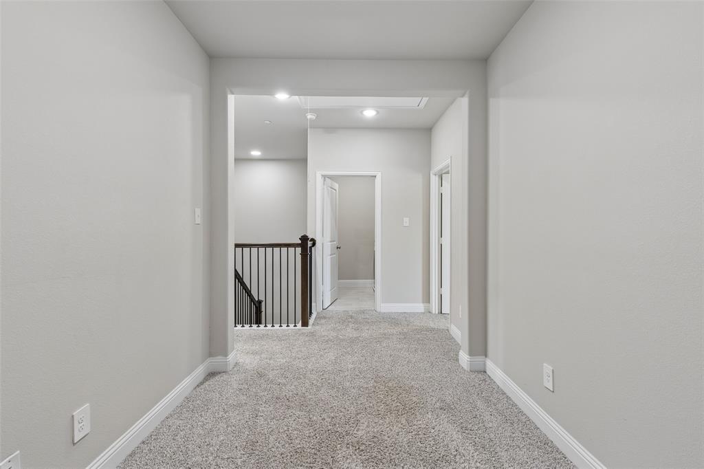 525 Teton Street Allen, TX 75002 - Photo 11 of 31 a view of a hallway with staircase