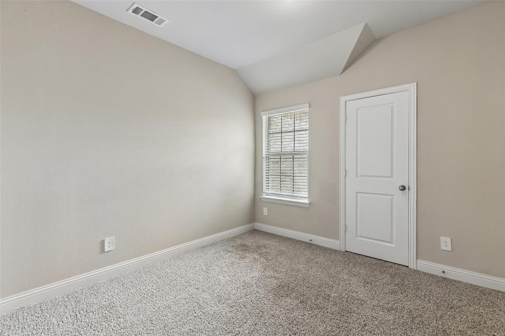 525 Teton Street Allen, TX 75002 - Photo 18 of 31 an empty room with windows