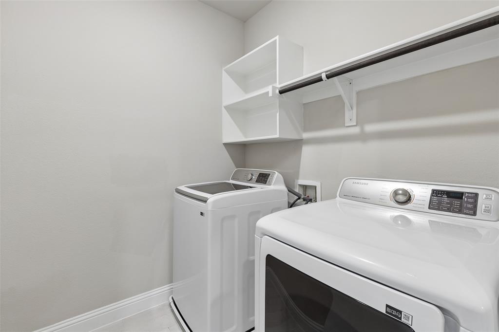 525 Teton Street Allen, TX 75002 - Photo 20 of 31 a utility room with dryer and washer