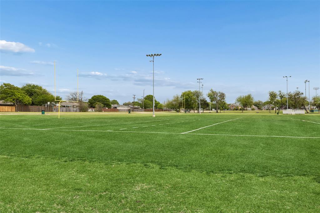 525 Teton Street Allen, TX 75002 - Photo 26 of 31 a view of a field with grass and trees