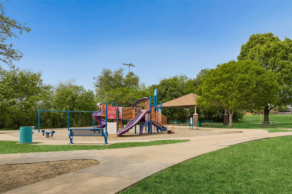 525 Teton Street Allen, TX 75002 - Photo 29 of 31 a view of park with swings and slides