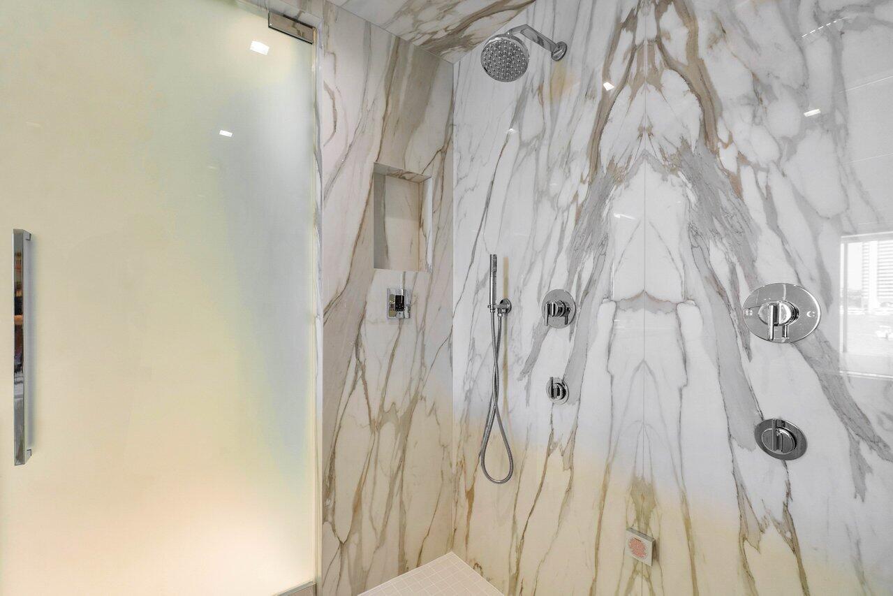 725 South Ocean Boulevard, Unit 202 Boca Raton, FL 33432 - Photo 15 of 57 a bathroom with a shower