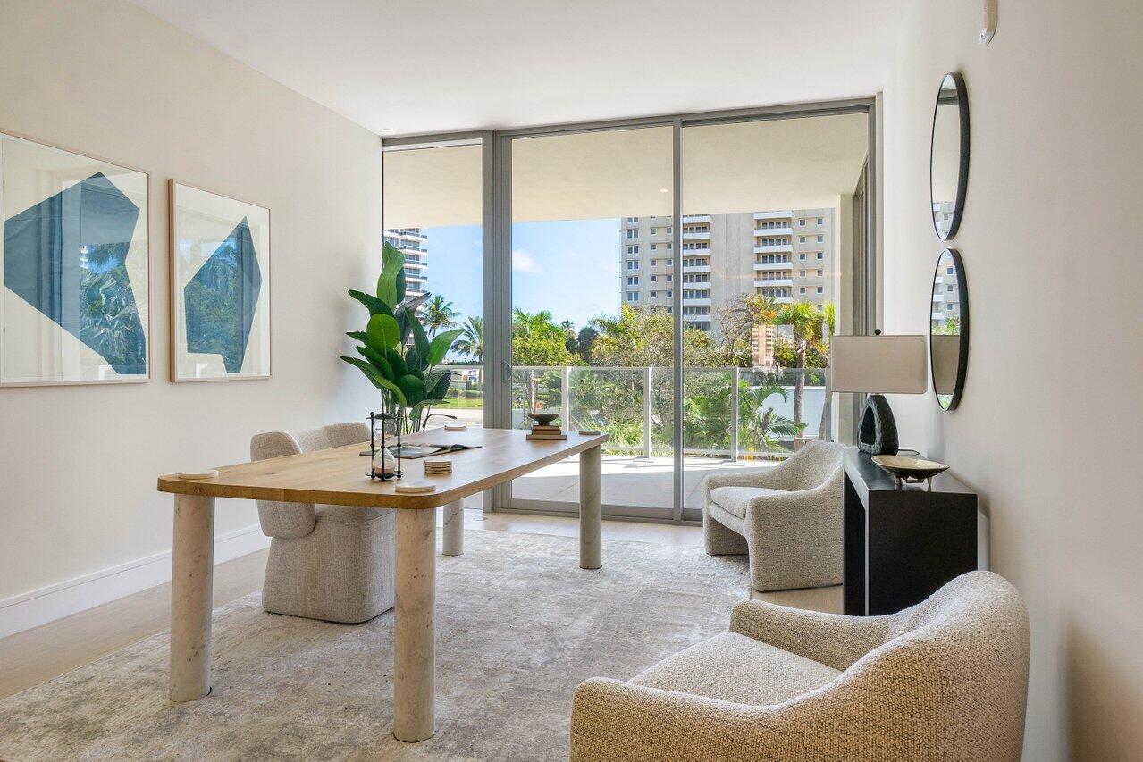 725 South Ocean Boulevard, Unit 202 Boca Raton, FL 33432 - Photo 20 of 57 a living room with furniture and a large window