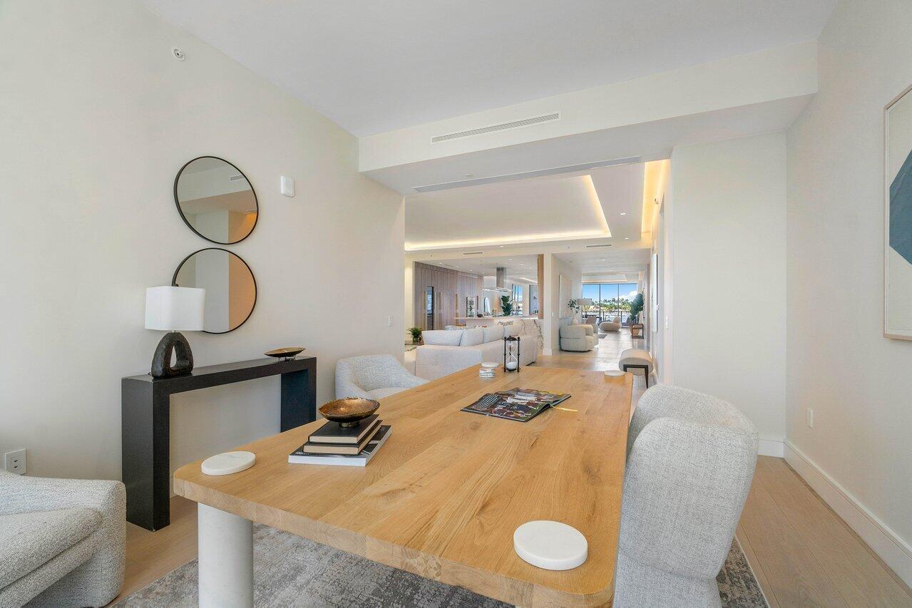 725 South Ocean Boulevard, Unit 202 Boca Raton, FL 33432 - Photo 21 of 57 a view of a dining room with furniture