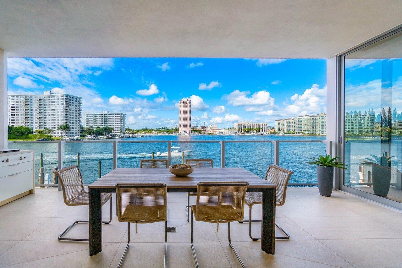 725 South Ocean Boulevard, Unit 202 Boca Raton, FL 33432 - Photo 3 of 57 a view of a dining room with furniture window and outside view