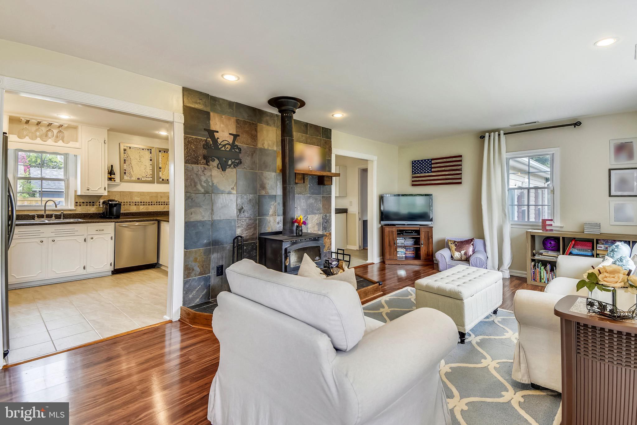 1354 Calvert Road Chester, MD 21619 - Photo 8 of 47 Cozy Living Room with Wood Stove