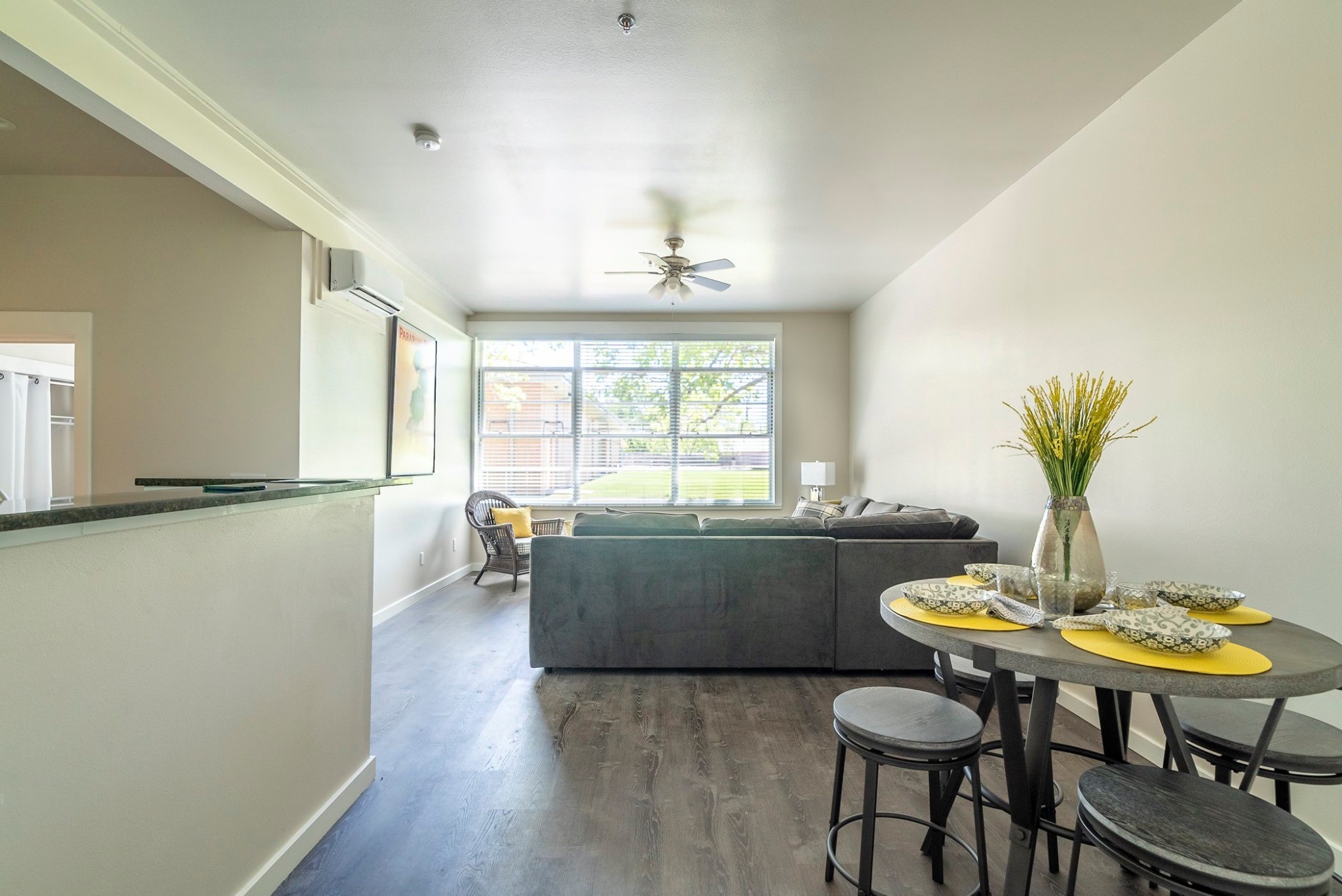 a living room with furniture and a table