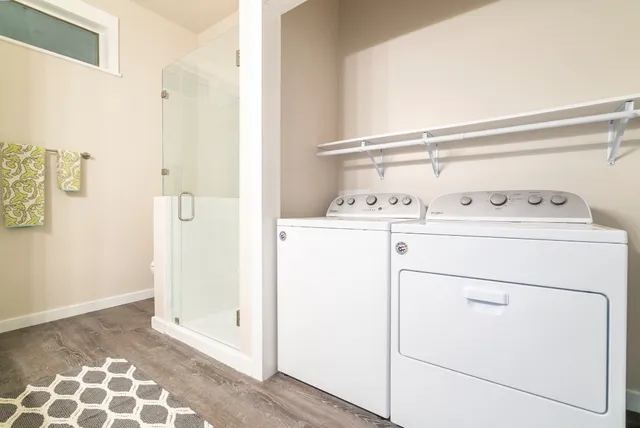 a utility room with dryer and washer