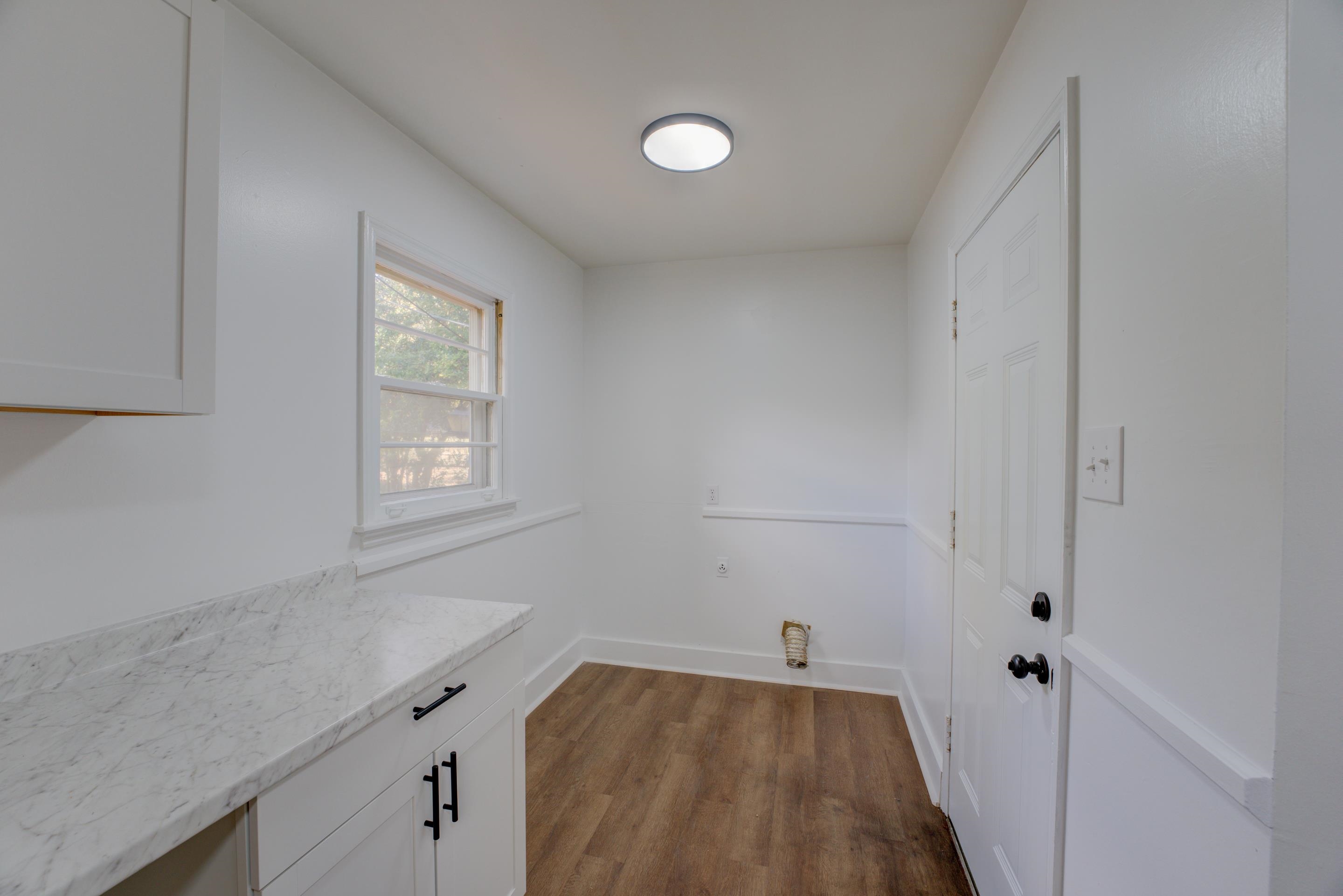 1609 South Perkins Road Memphis, TN 38117 - Photo 17 of 23 a view of a room that has a sink and dishwasher window