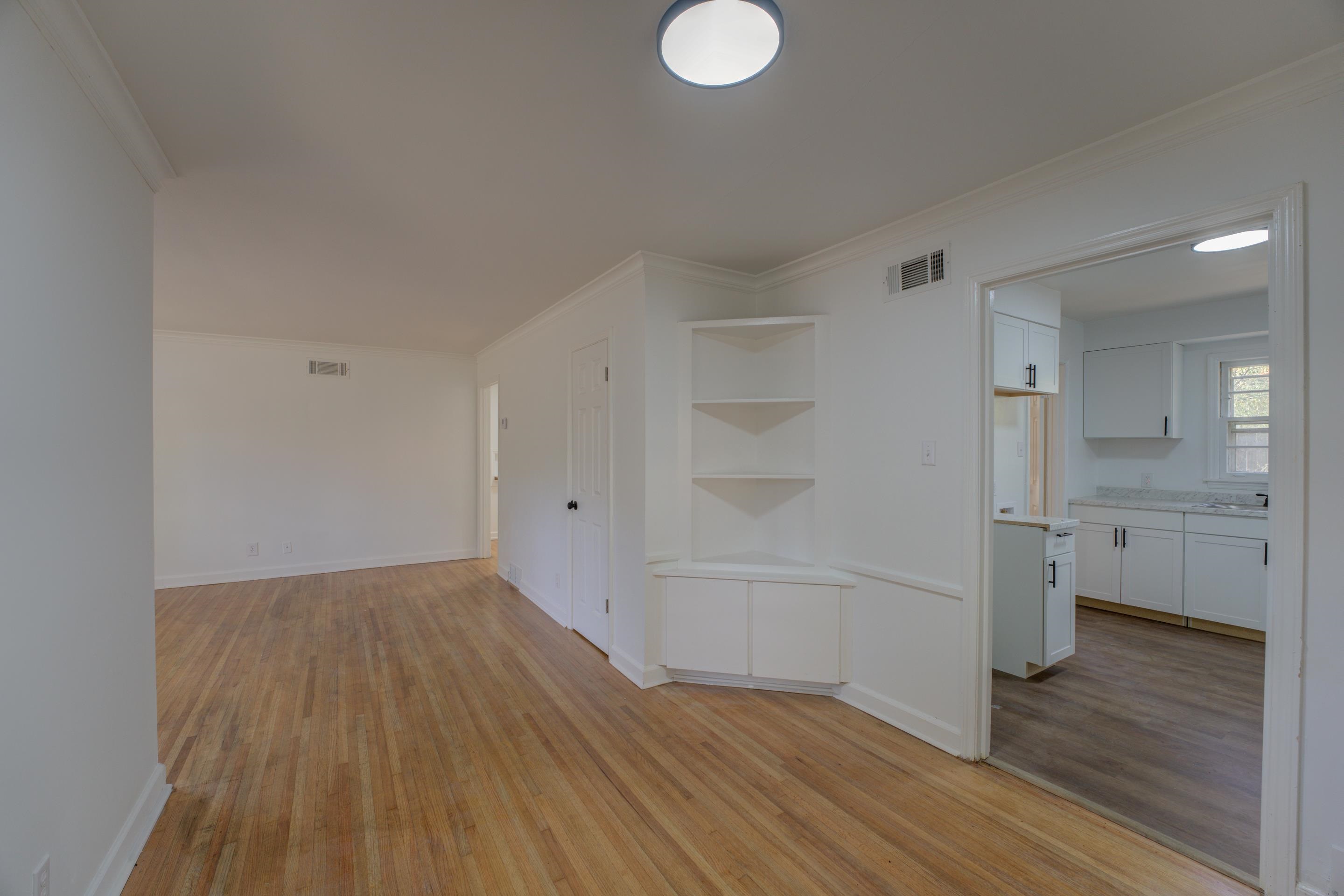 1609 South Perkins Road Memphis, TN 38117 - Photo 21 of 23 a view of empty room with wooden floor