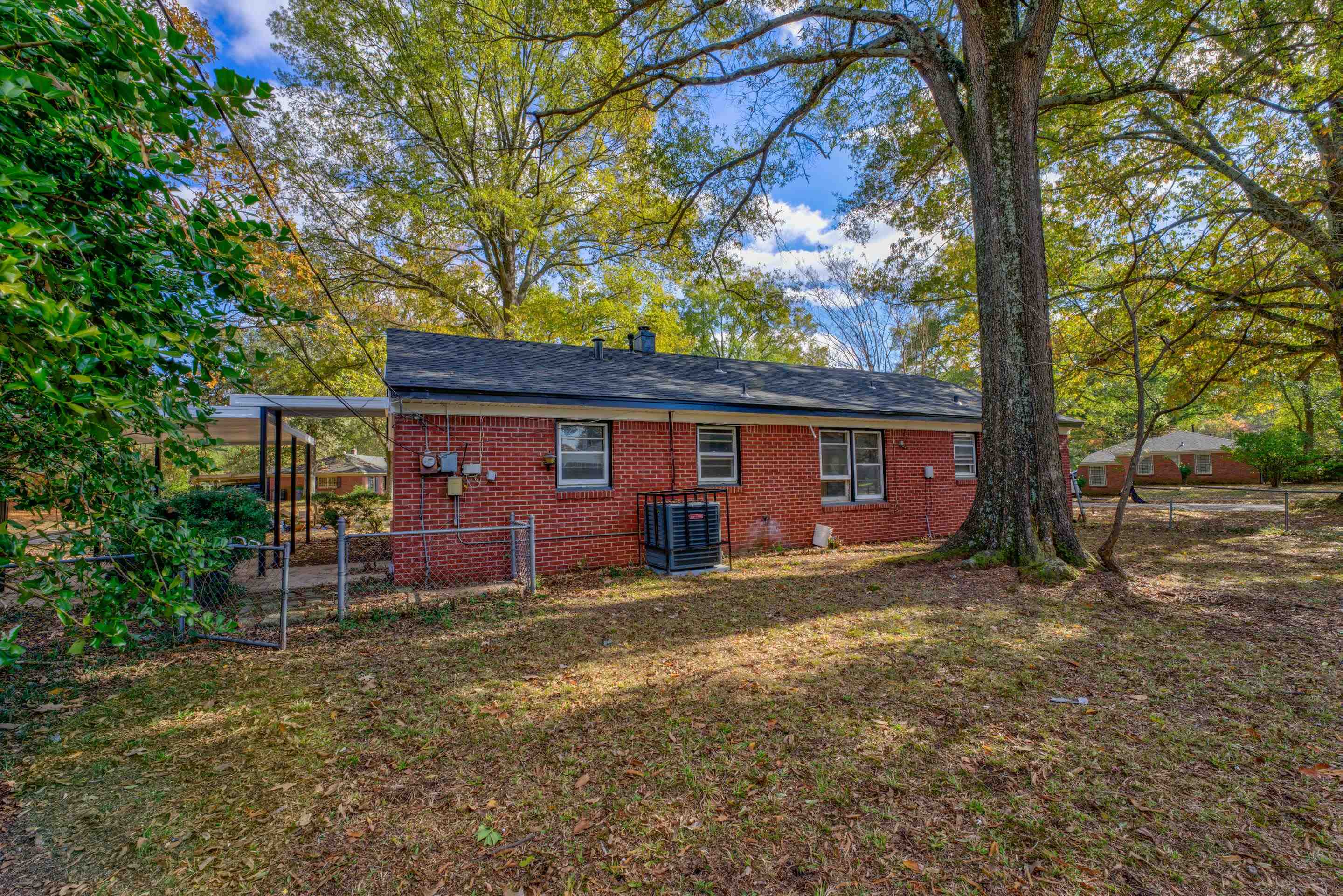 1609 South Perkins Road Memphis, TN 38117 - Photo 22 of 23 a view of a house with a yard