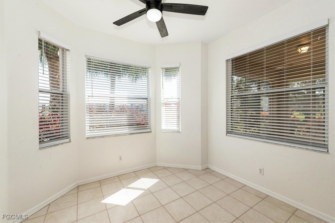 14111 Brant Point Circle, Unit 2106 Fort Myers, FL 33919 - Photo 12 of 31 a view of an empty room with a window