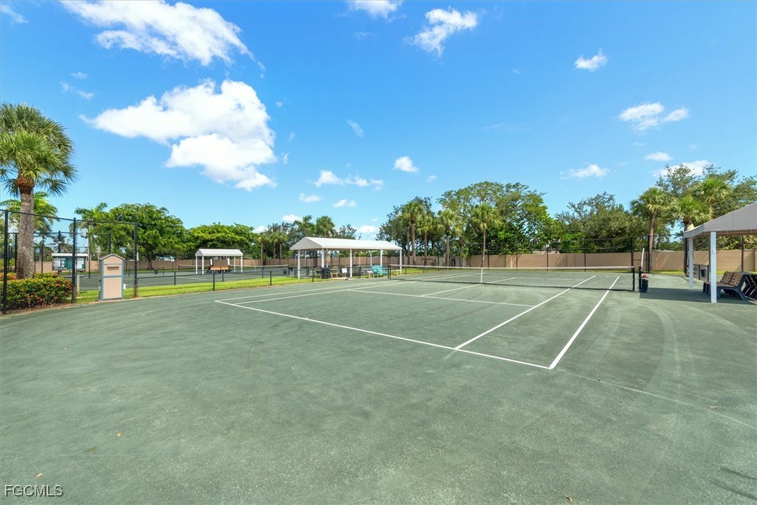 14111 Brant Point Circle, Unit 2106 Fort Myers, FL 33919 - Photo 28 of 31 a view of a tennis court