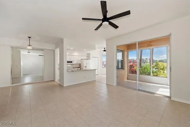 a view of a kitchen with a sink and a window