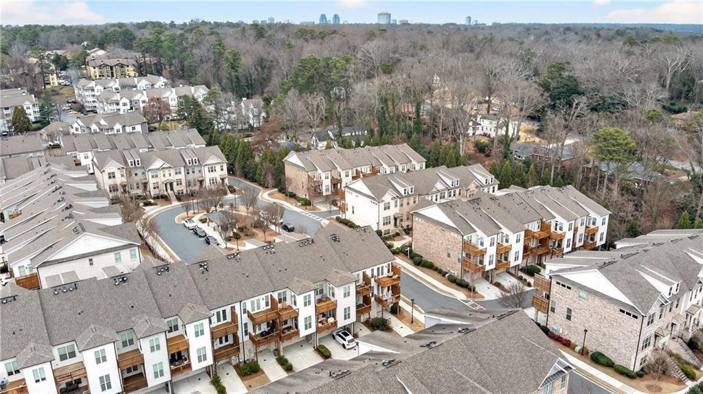 4302 Parkside Place Atlanta, GA 30342 - Photo 33 of 33 an aerial view of a city with lots of residential buildings