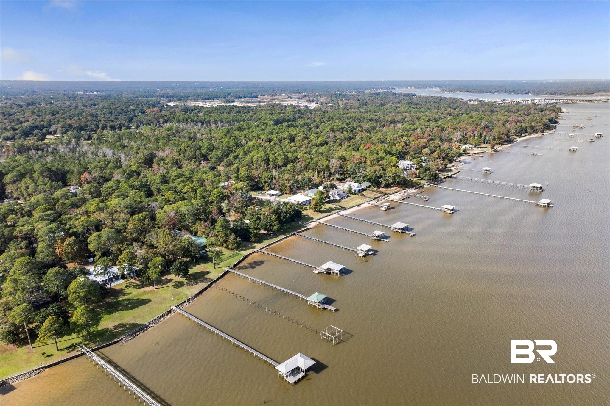 7015 Bay Road Mobile, AL 36605 - Photo 46 of 53 Aerial view of property and surrounding area with a forest and a nearby body of water