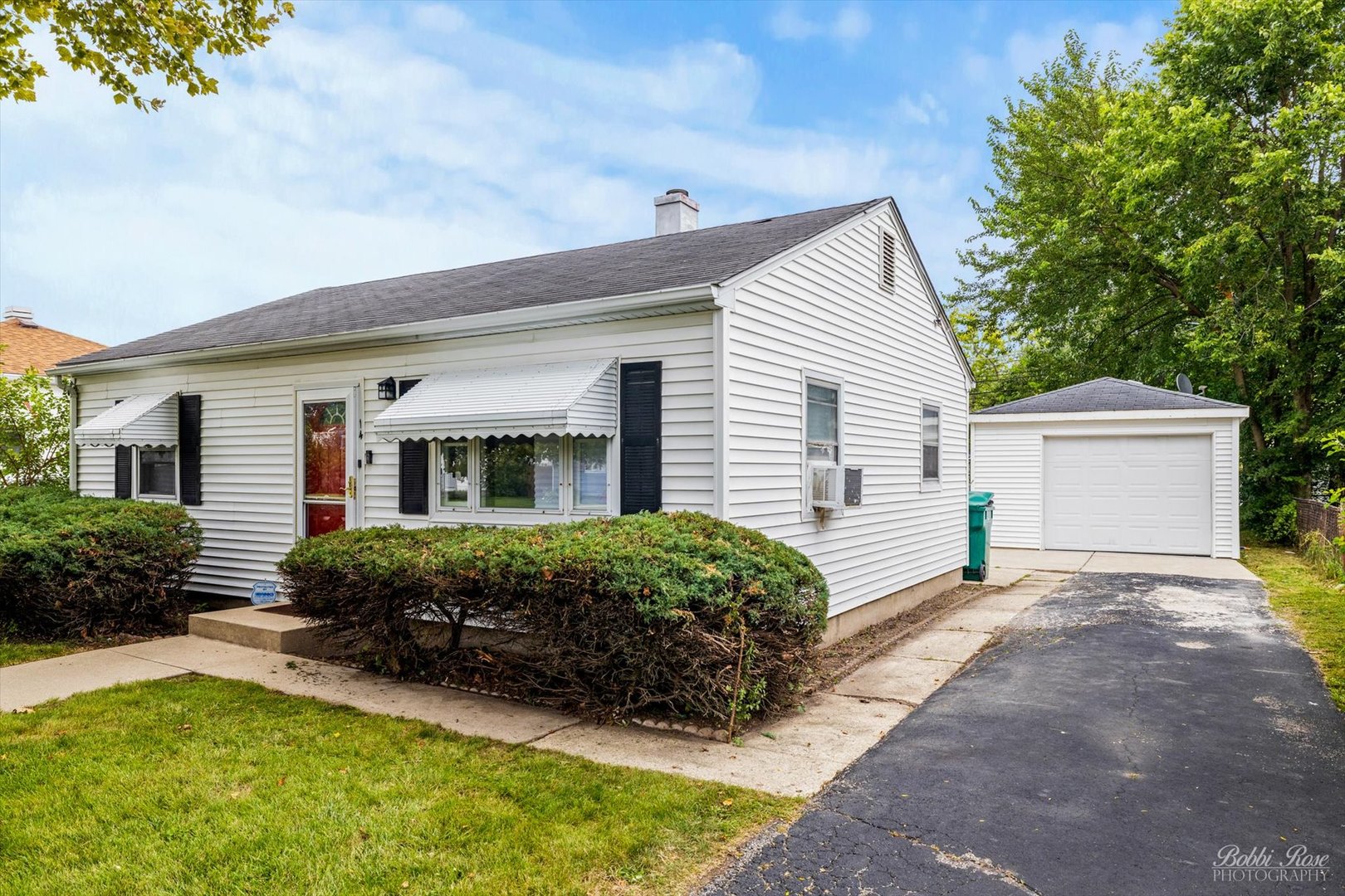14 Salem Drive Joliet, IL 60436 - Photo 15 of 15 a front view of a house with garden