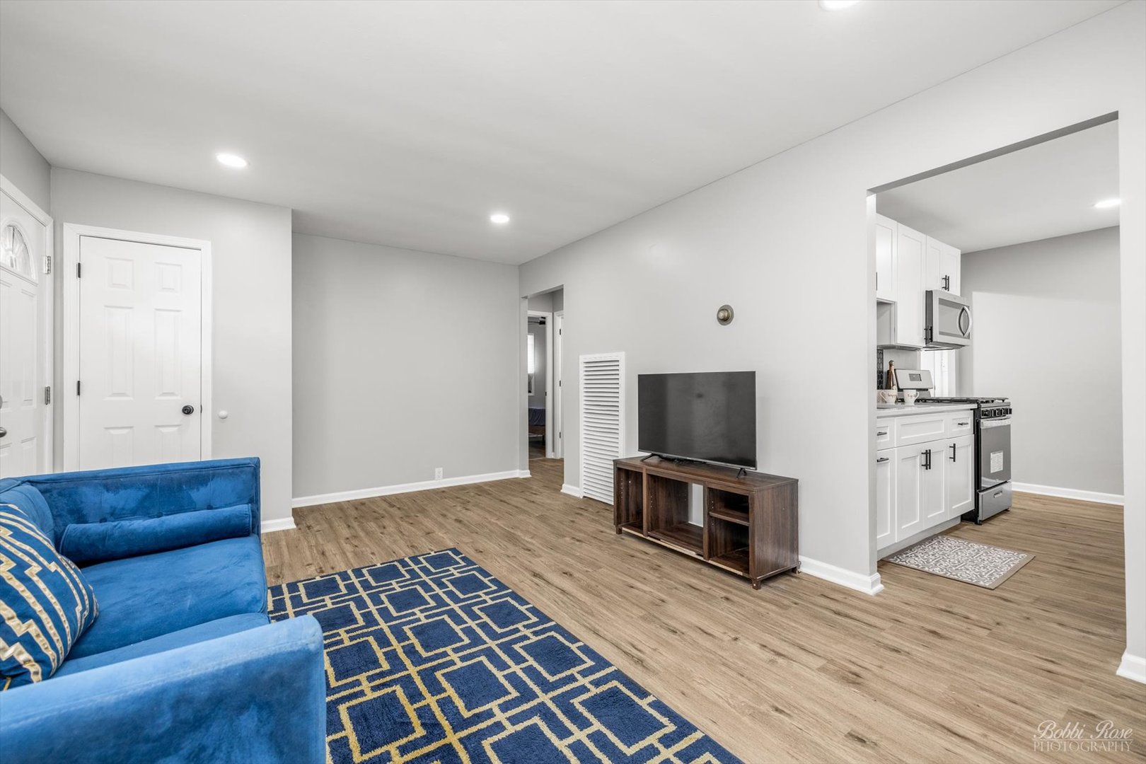 14 Salem Drive Joliet, IL 60436 - Photo 4 of 15 a living room with furniture and a flat screen tv