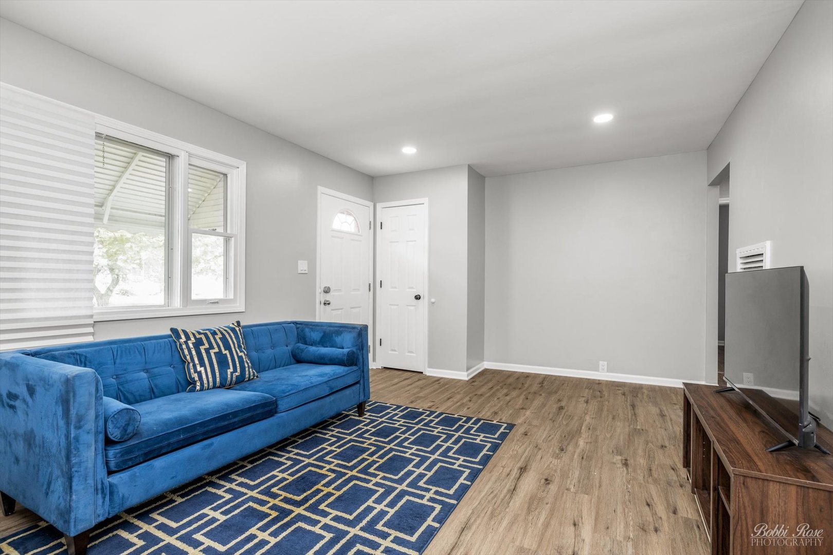 14 Salem Drive Joliet, IL 60436 - Photo 5 of 15 a living room with furniture and a flat screen tv