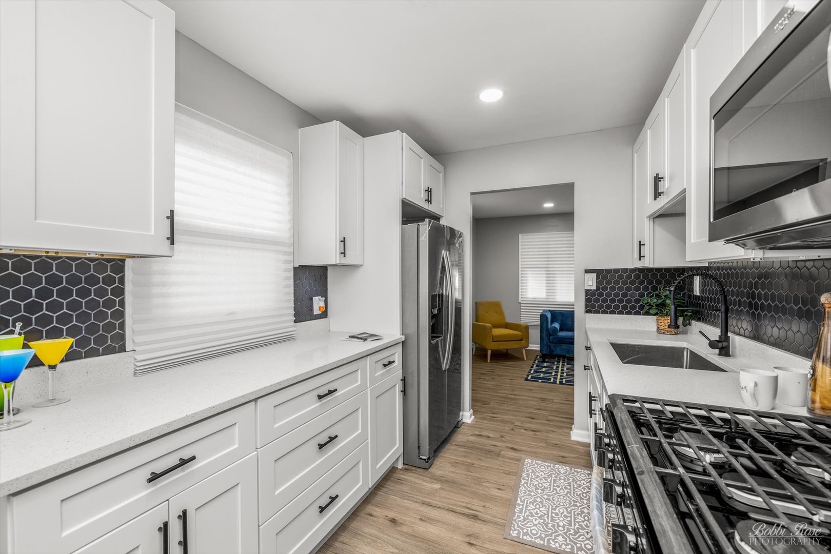 14 Salem Drive Joliet, IL 60436 - Photo 7 of 15 a kitchen with a sink a stove and cabinets