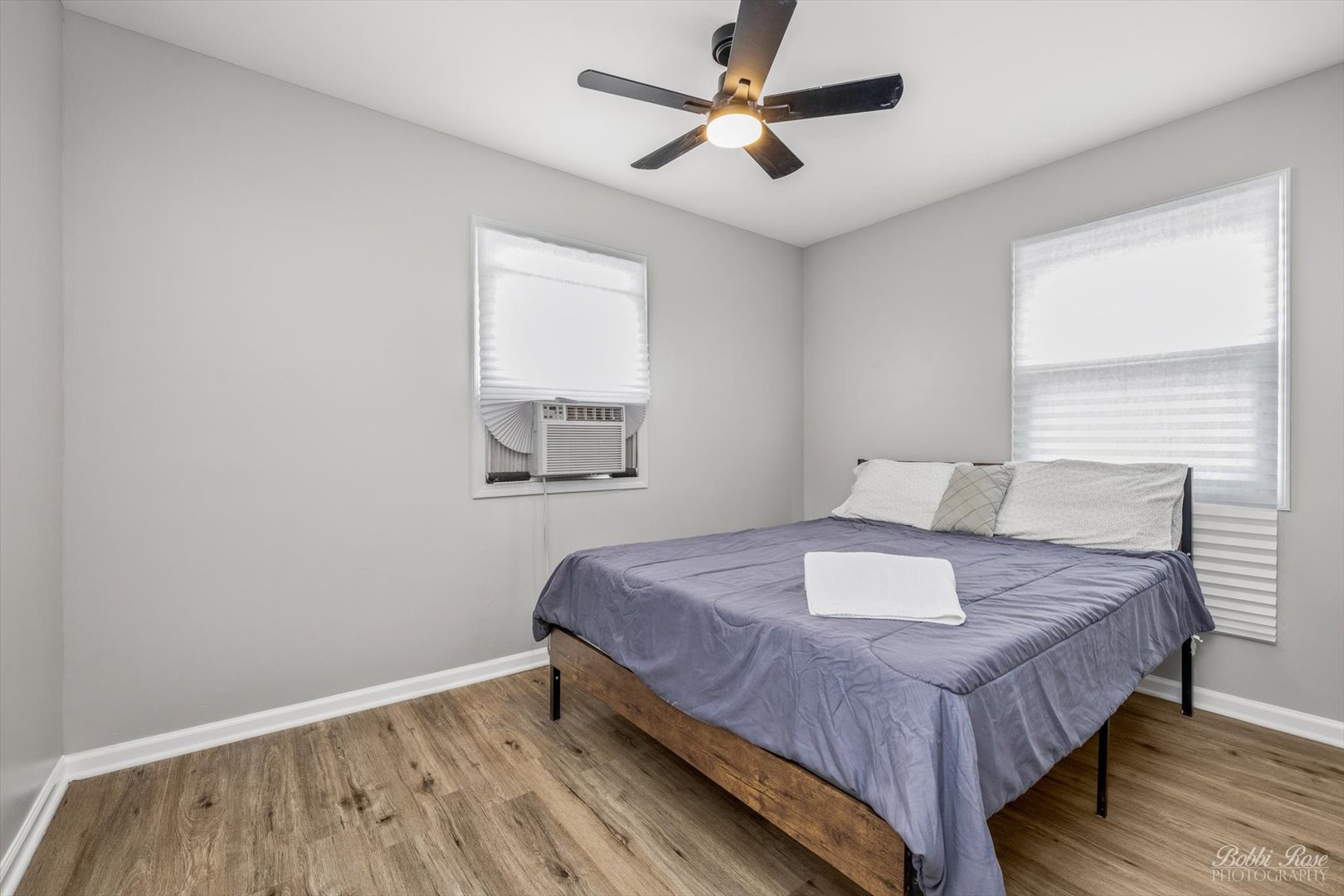 14 Salem Drive Joliet, IL 60436 - Photo 8 of 15 a bedroom with a bed and a window