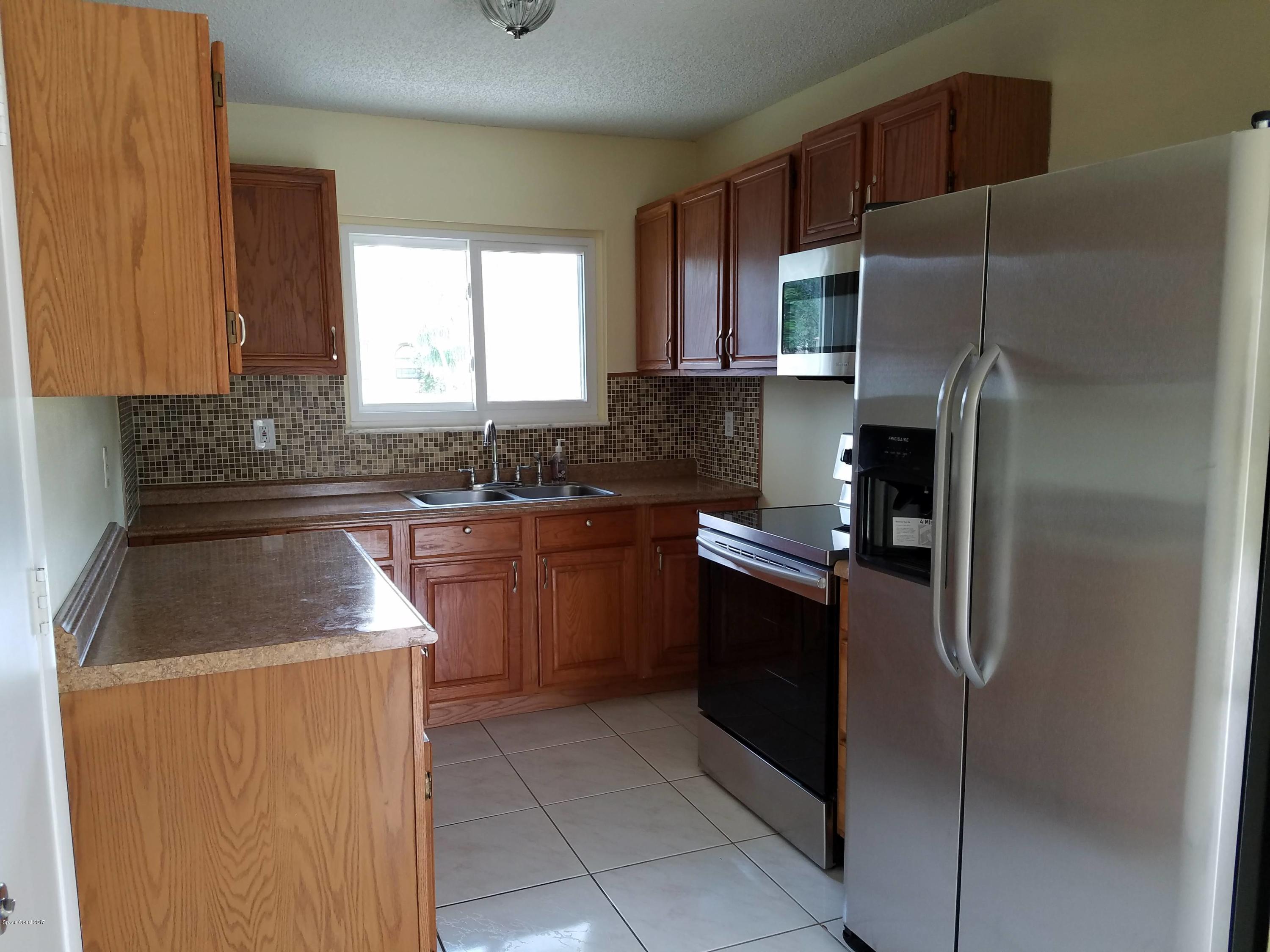 875 Rostock Circle Northwest Palm Bay, FL 32907 - Photo 8 of 13 20170517_124627