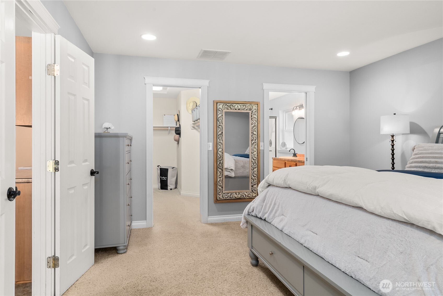 46 Richard Lane Elma, WA 98541 - Photo 12 of 40 a spacious bedroom with a bed and a walk in closet
