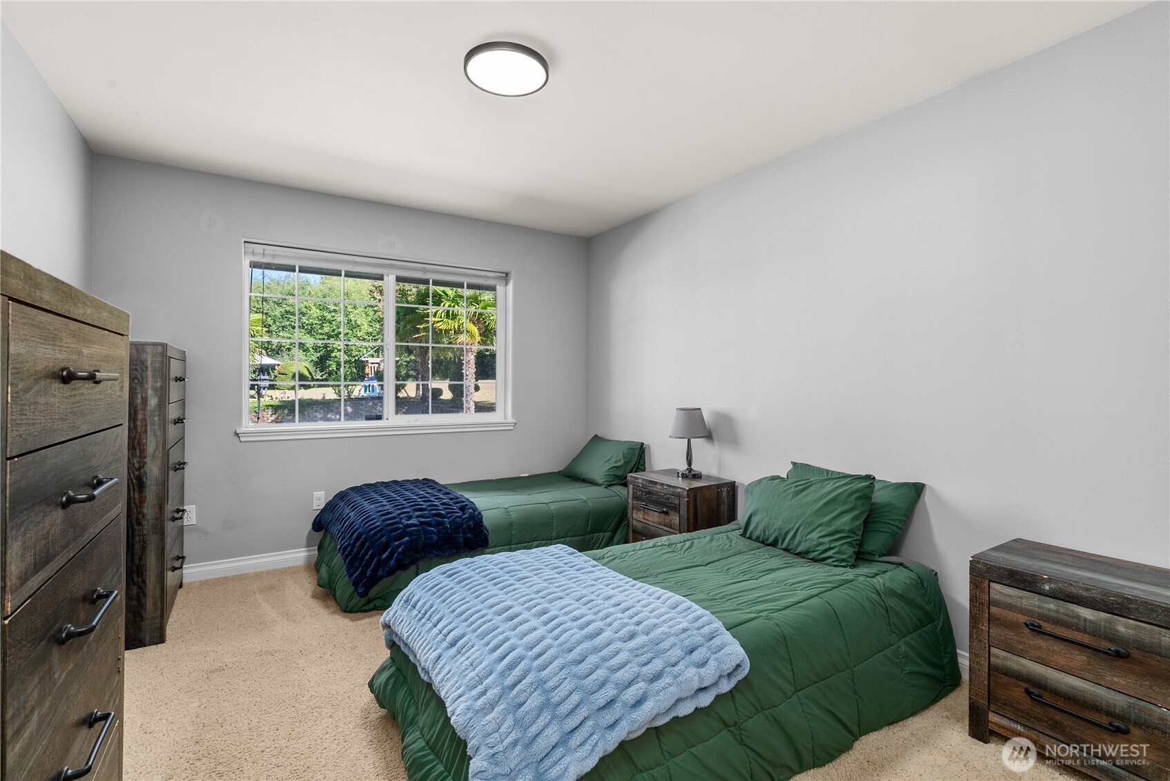46 Richard Lane Elma, WA 98541 - Photo 15 of 40 a bedroom with two beds and a window