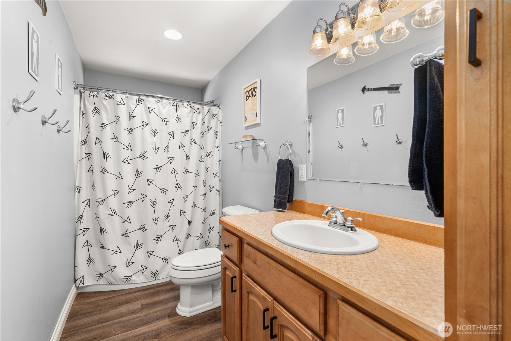46 Richard Lane Elma, WA 98541 - Photo 16 of 40 a bathroom with a sink toilet and shower
