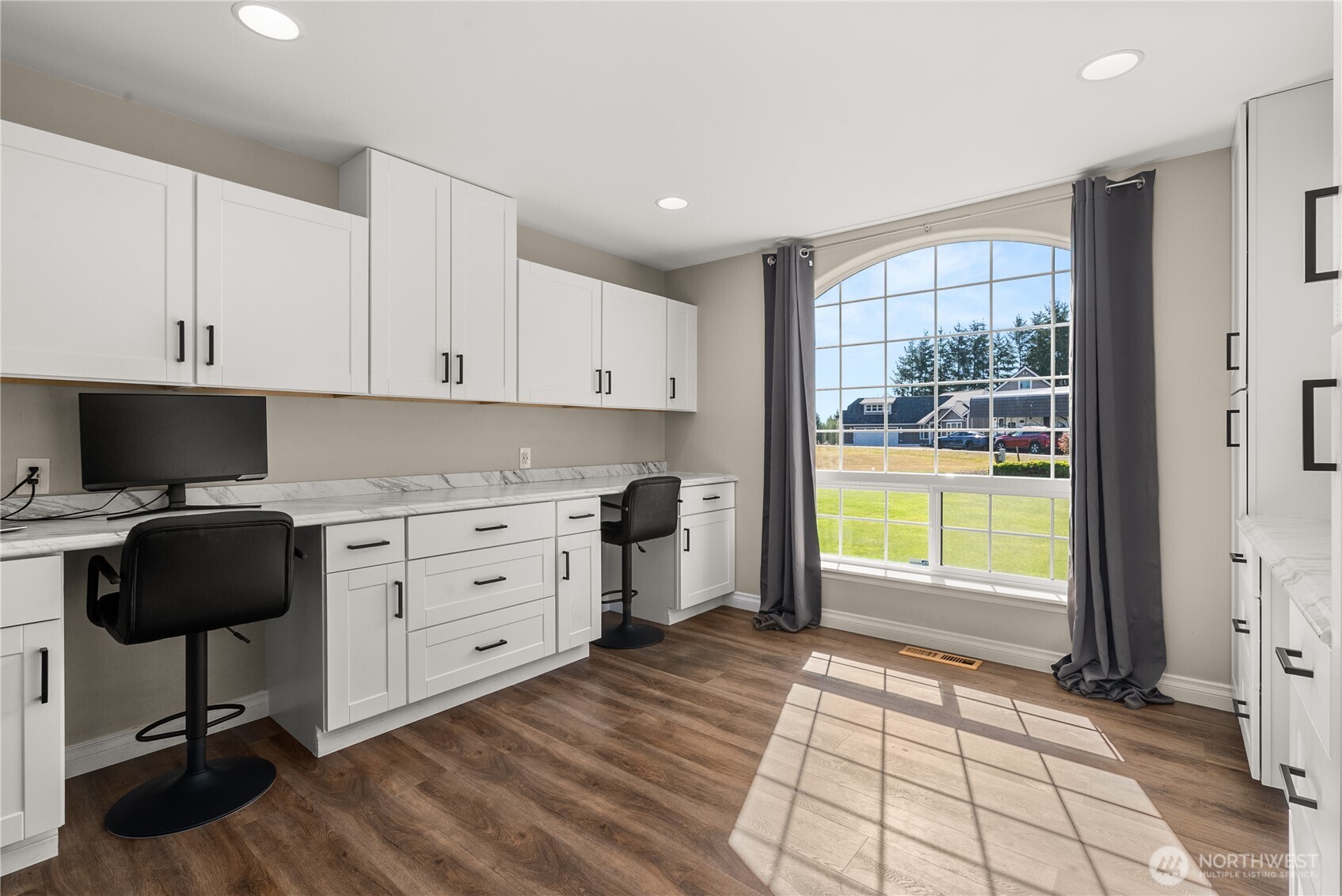 46 Richard Lane Elma, WA 98541 - Photo 17 of 40 a kitchen with granite countertop a stove a sink and a window