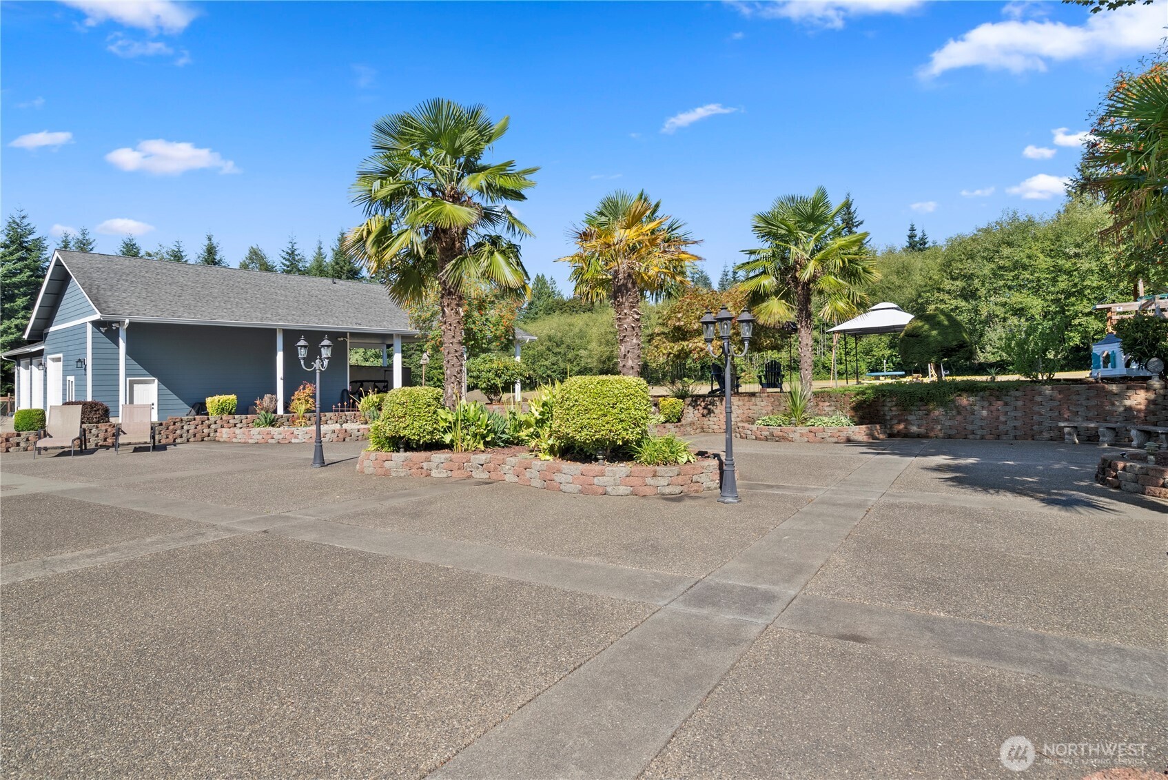 46 Richard Lane Elma, WA 98541 - Photo 24 of 40 a view of a street with palm trees