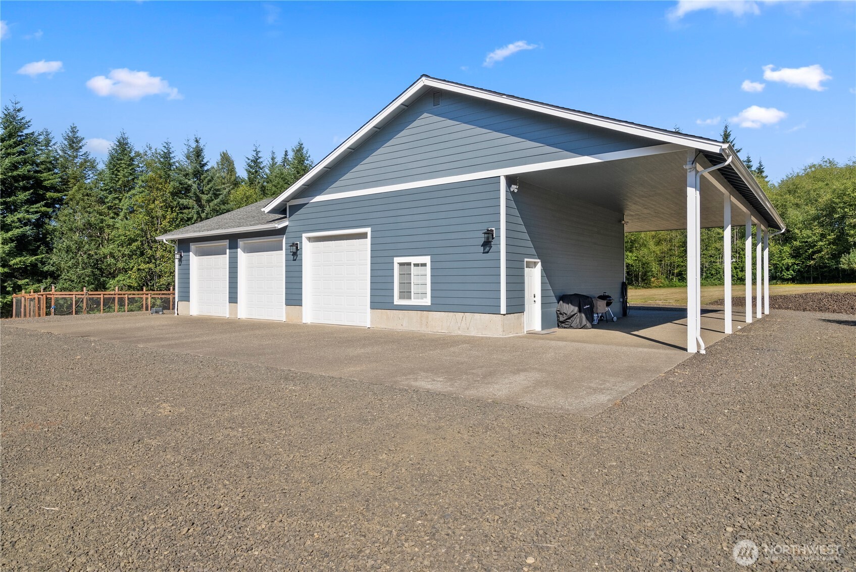 46 Richard Lane Elma, WA 98541 - Photo 26 of 40 a view of a house with a yard and potted plants