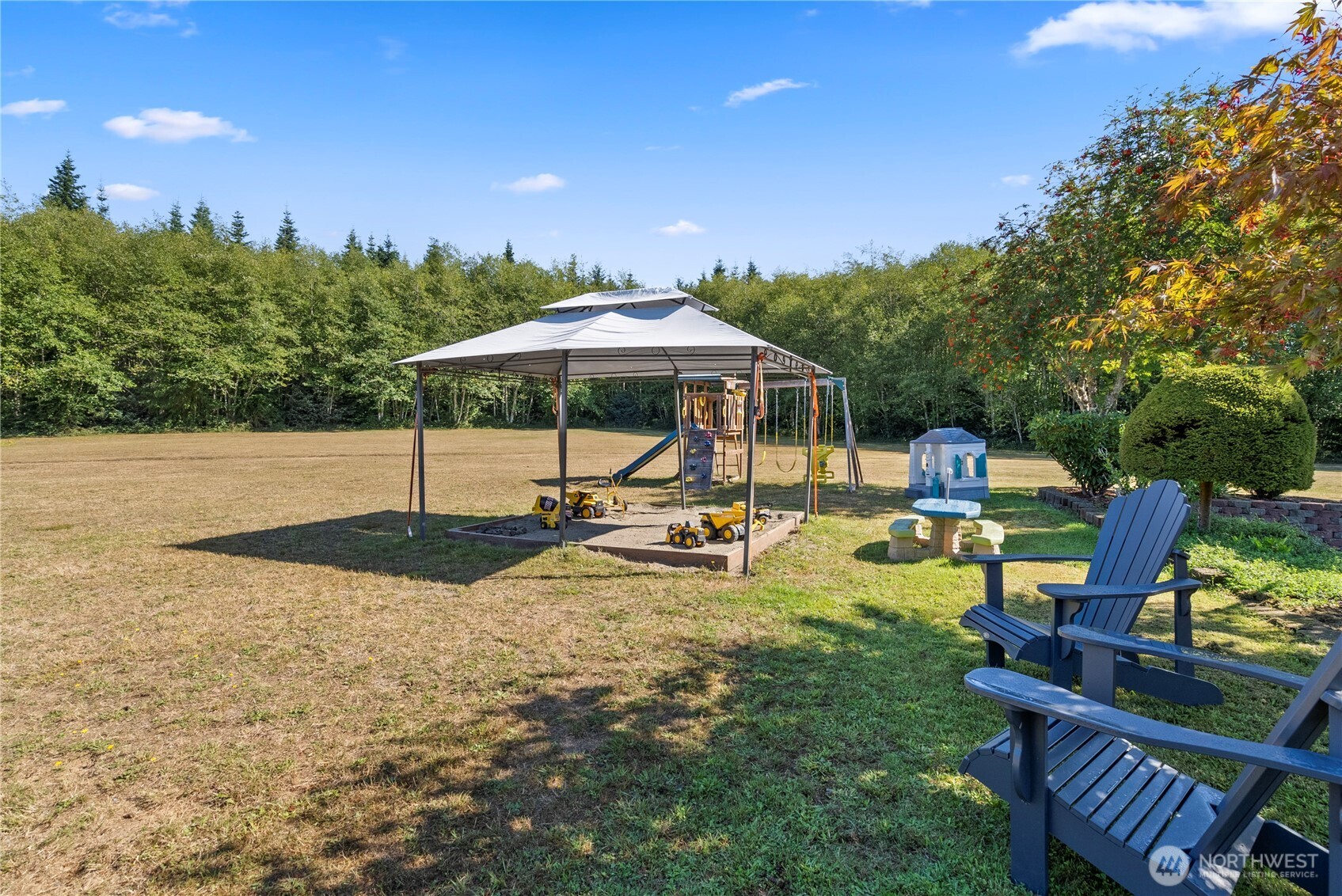 46 Richard Lane Elma, WA 98541 - Photo 37 of 40 a view of a swimming pool with a patio