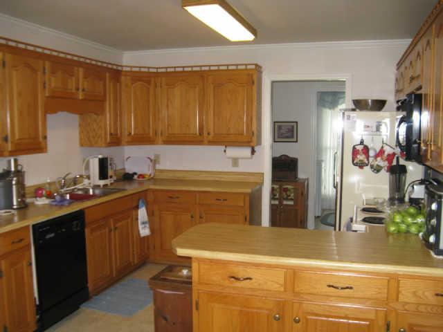 2115 Red Mile Road Murfreesboro, TN 37127 - Photo 5 of 14 Your kitchen has lots of cabinet space and comes with the refrigerator too!