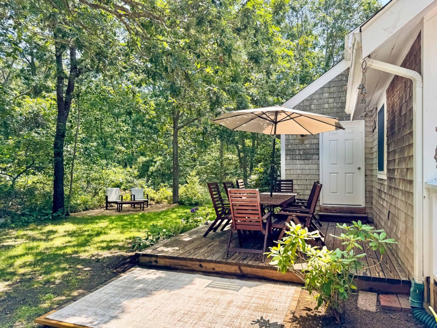 58 Rd To The Plaines Edgartown, MA 02539 - Photo 4 of 40 Dining area set on the side deck