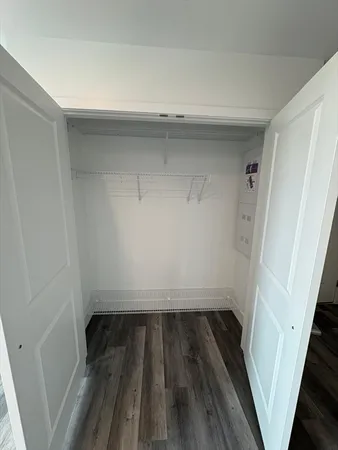 a view of wooden floor in a bathroom