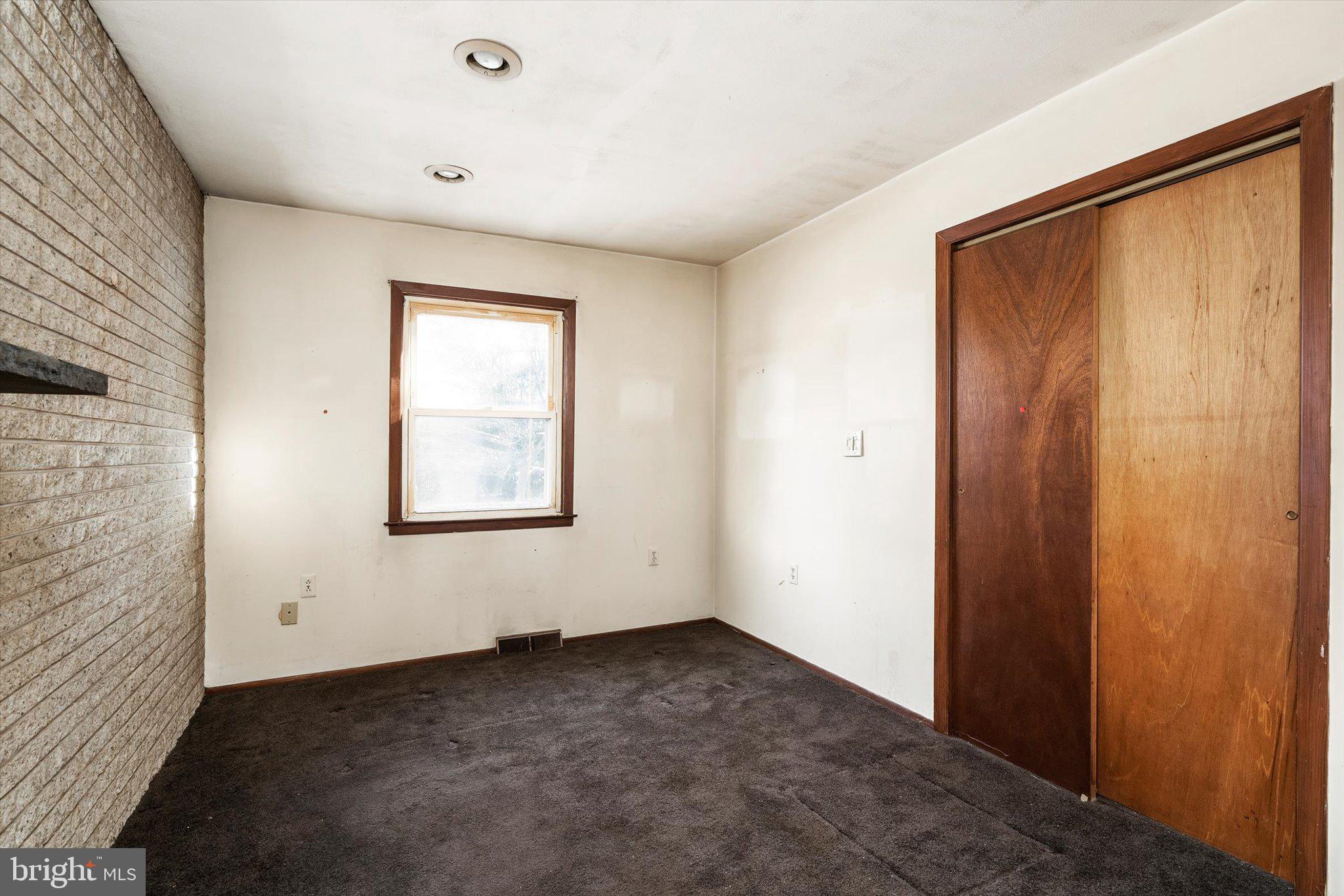 179 Saybrook Avenue Hamilton, NJ 08619 - Photo 16 of 26 an empty room with windows