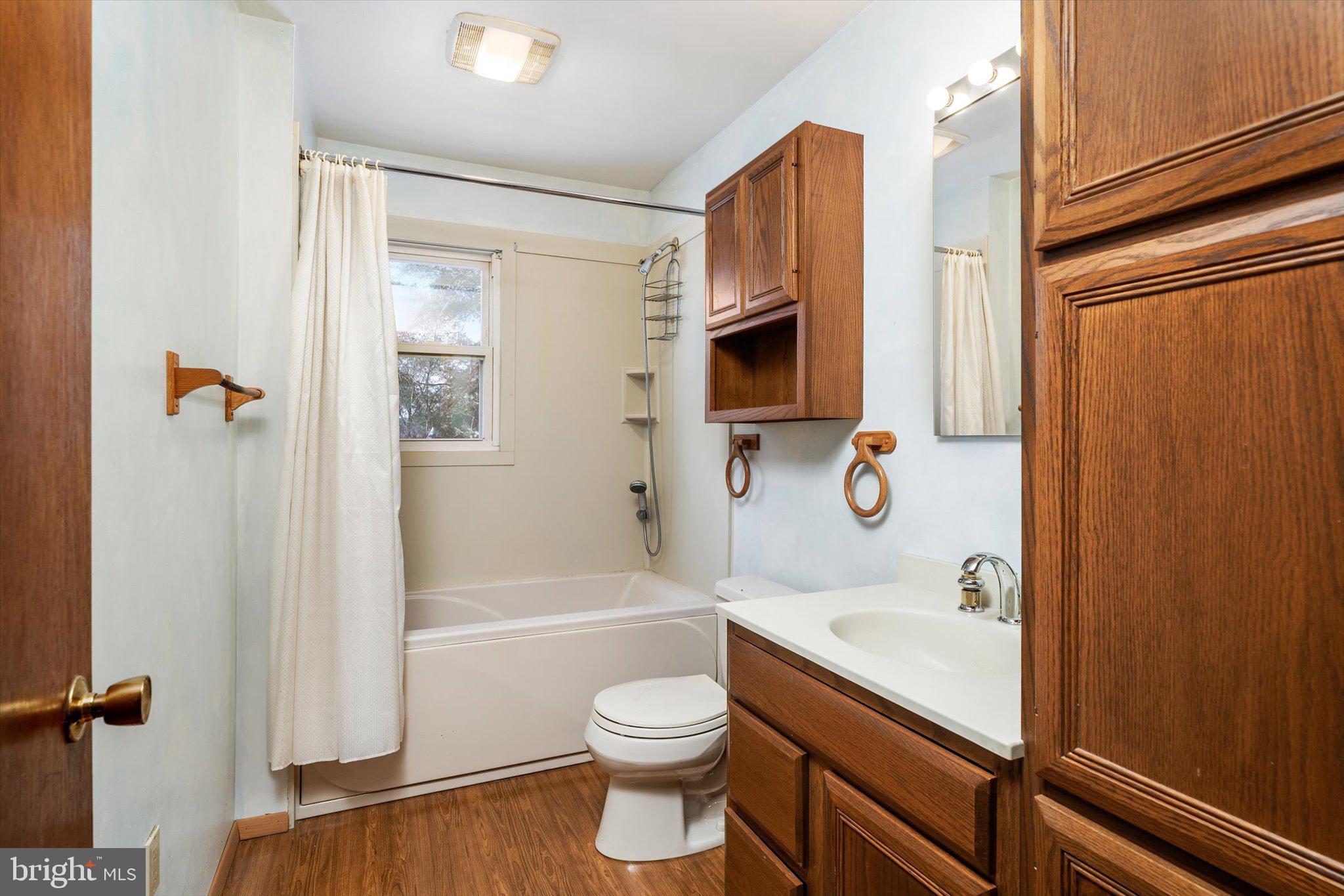 179 Saybrook Avenue Hamilton, NJ 08619 - Photo 21 of 26 a bathroom with a sink a toilet and shower