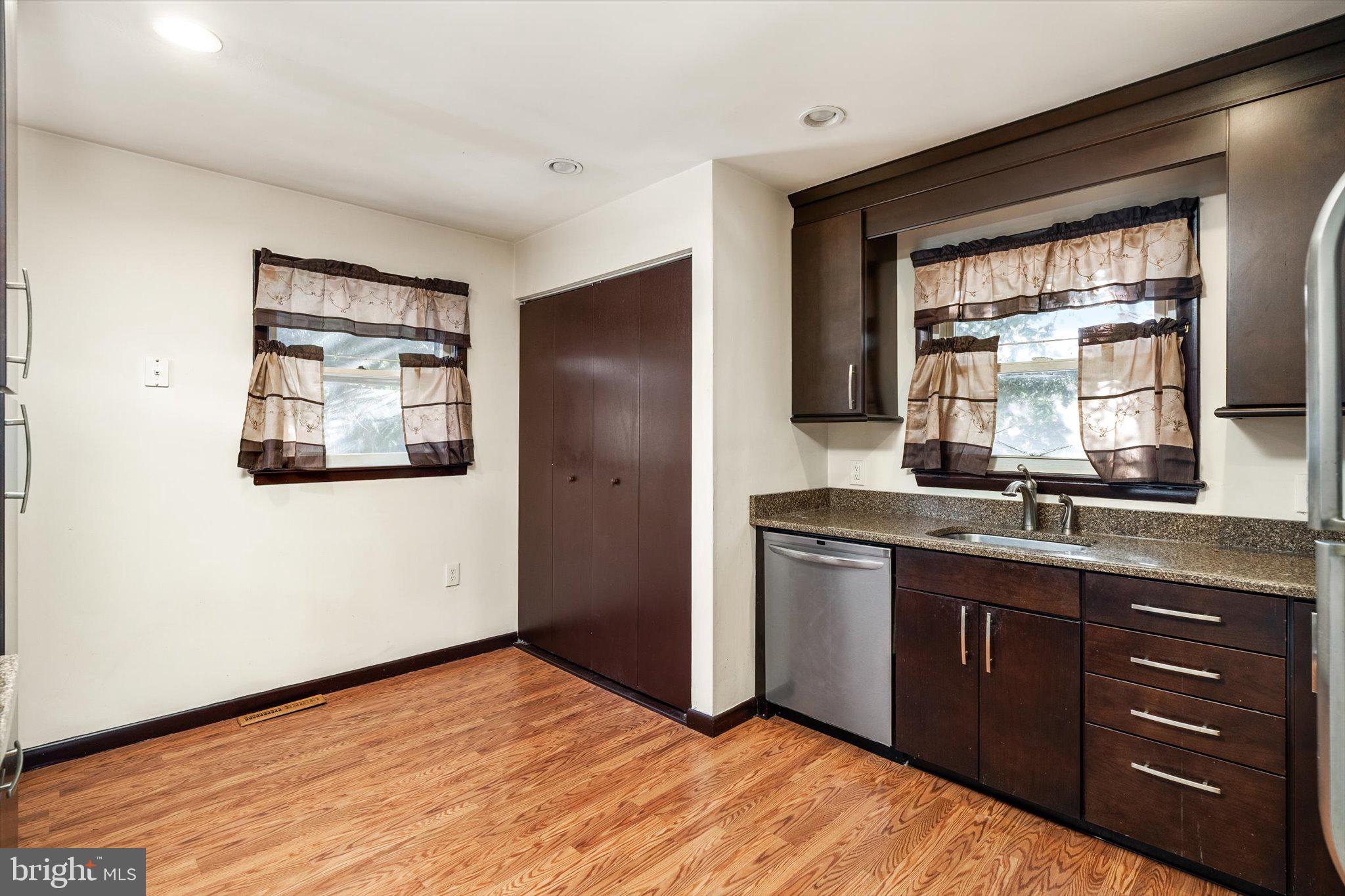179 Saybrook Avenue Hamilton, NJ 08619 - Photo 8 of 26 a kitchen with a stove and a sink