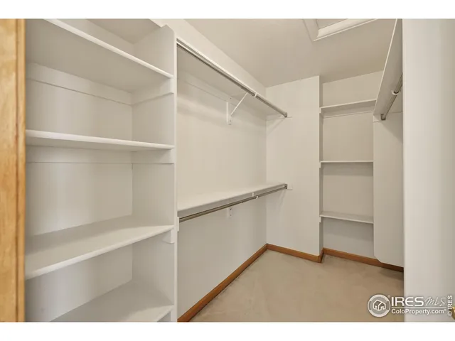 a view of an empty walk in closet