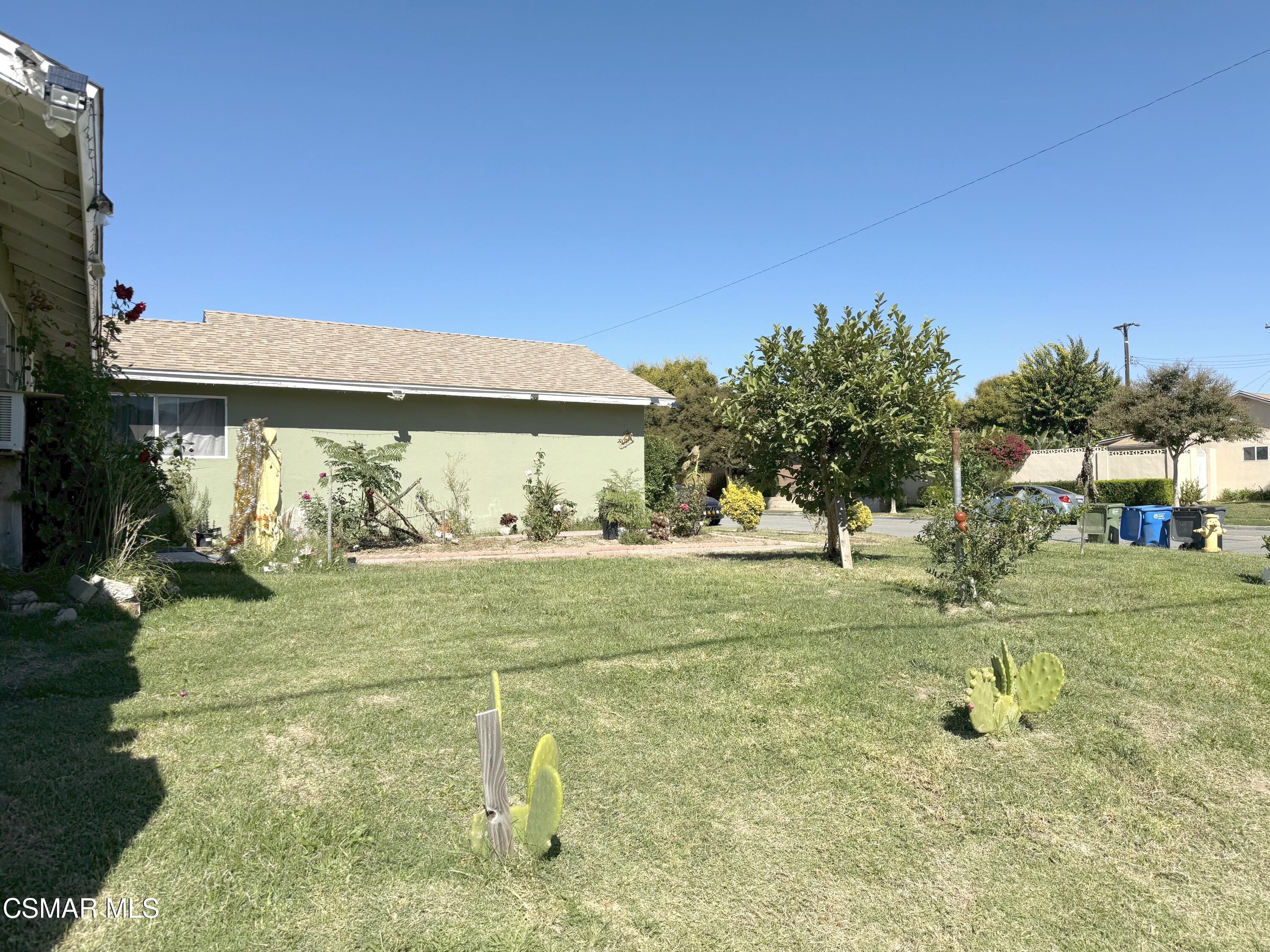 1007 Haven Avenue Simi Valley, CA 93065 - Photo 3 of 6 a view of a garden with a house