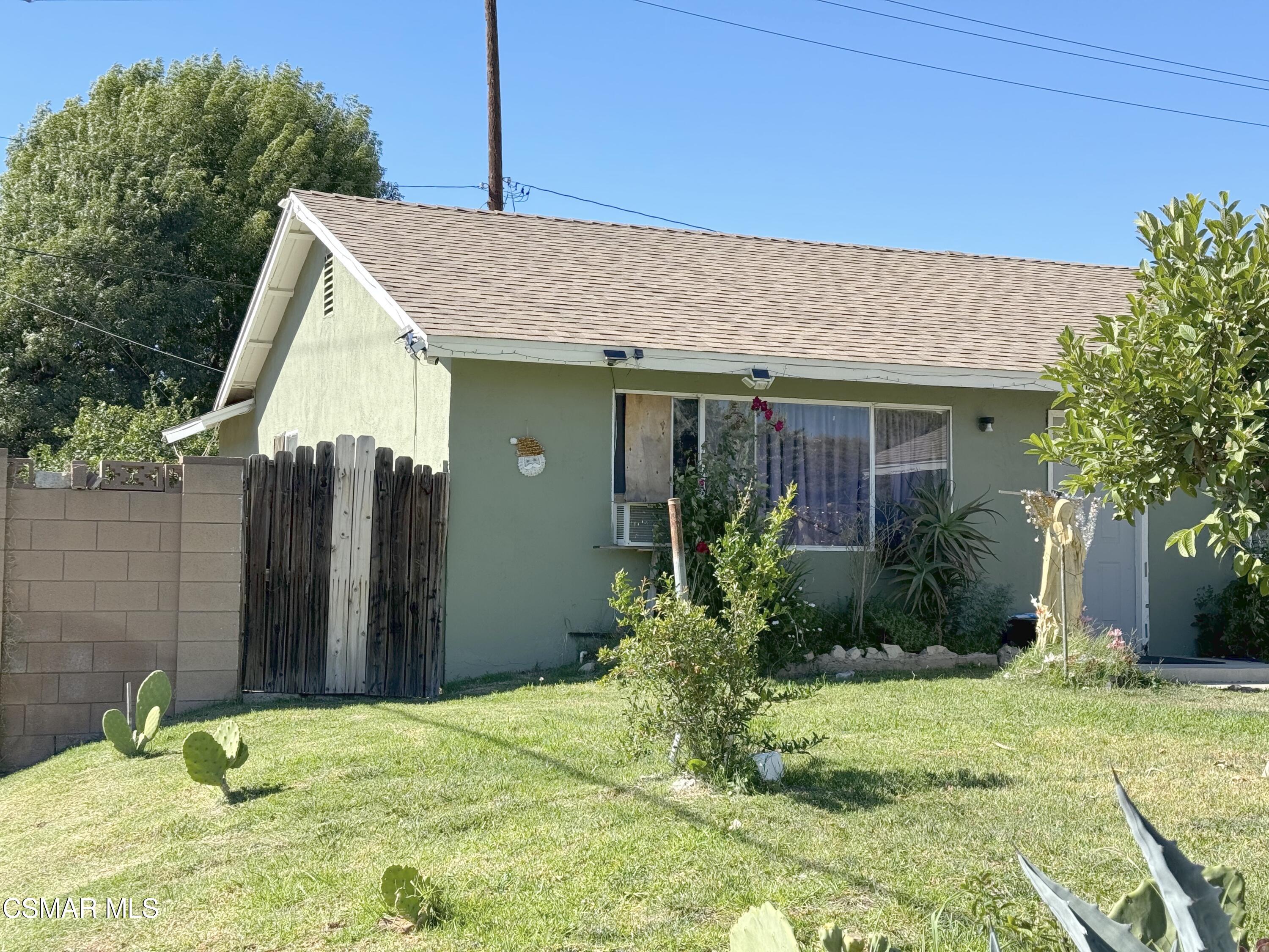 1007 Haven Avenue Simi Valley, CA 93065 - Photo 4 of 6 a view of a house with backyard and plants