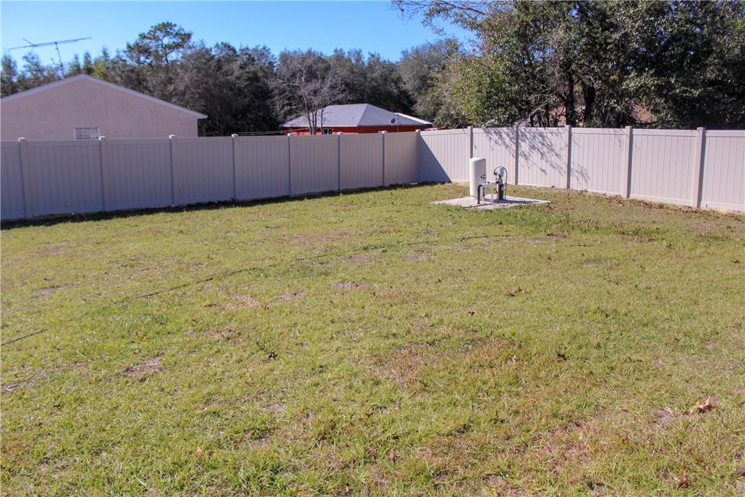 9643 Bahia Road Ocala, FL 34472 - Photo 14 of 16 a view of a backyard