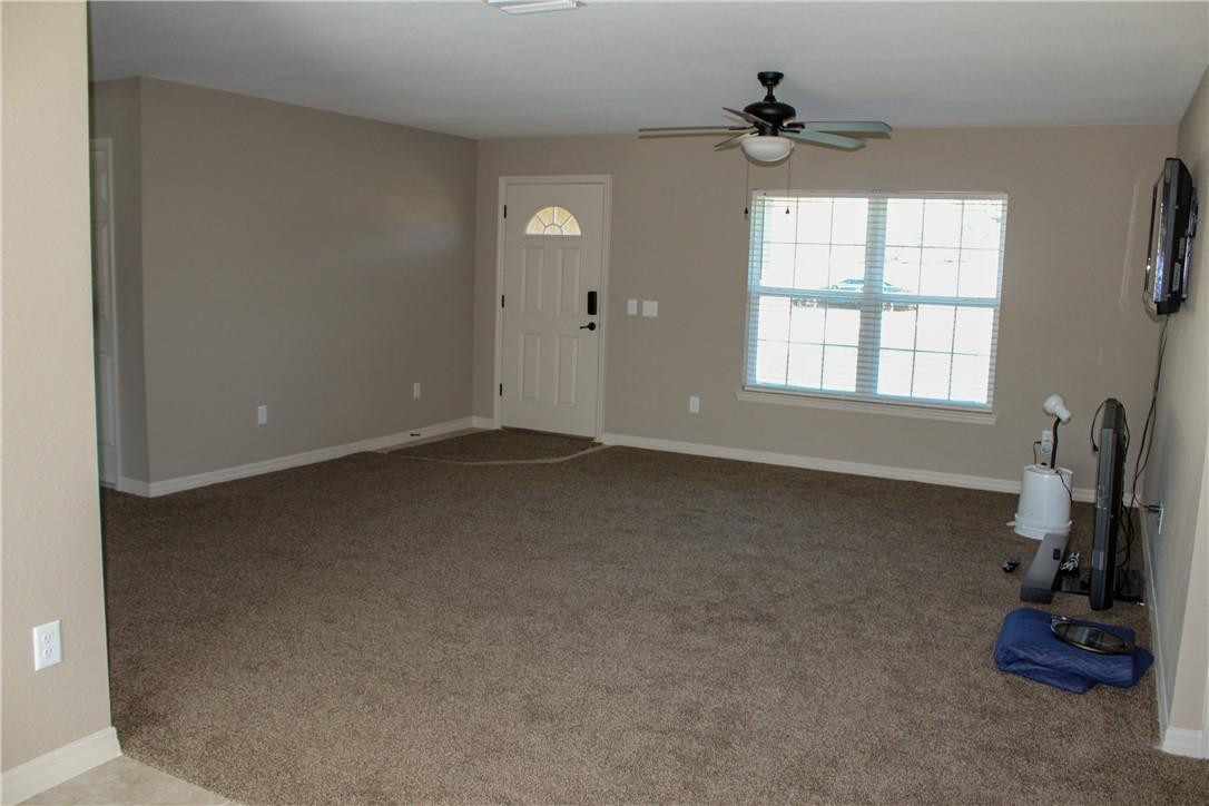 9643 Bahia Road Ocala, FL 34472 - Photo 6 of 16 wooden floor and window in an empty room