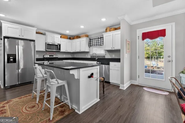 a bed room with a bed and a window