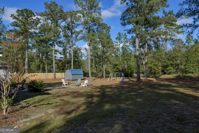 a room with furniture and a flat screen tv