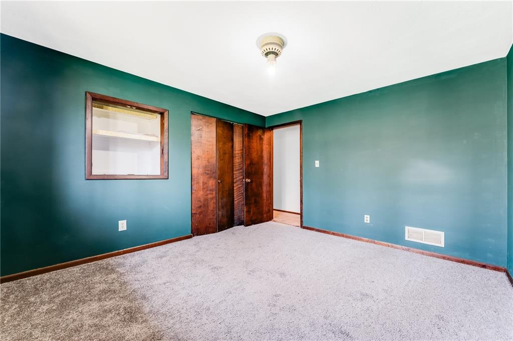 440 Steiner Bridge Road Valencia, PA 16059 - Photo 16 of 45 a view of a room with a large window and stairs