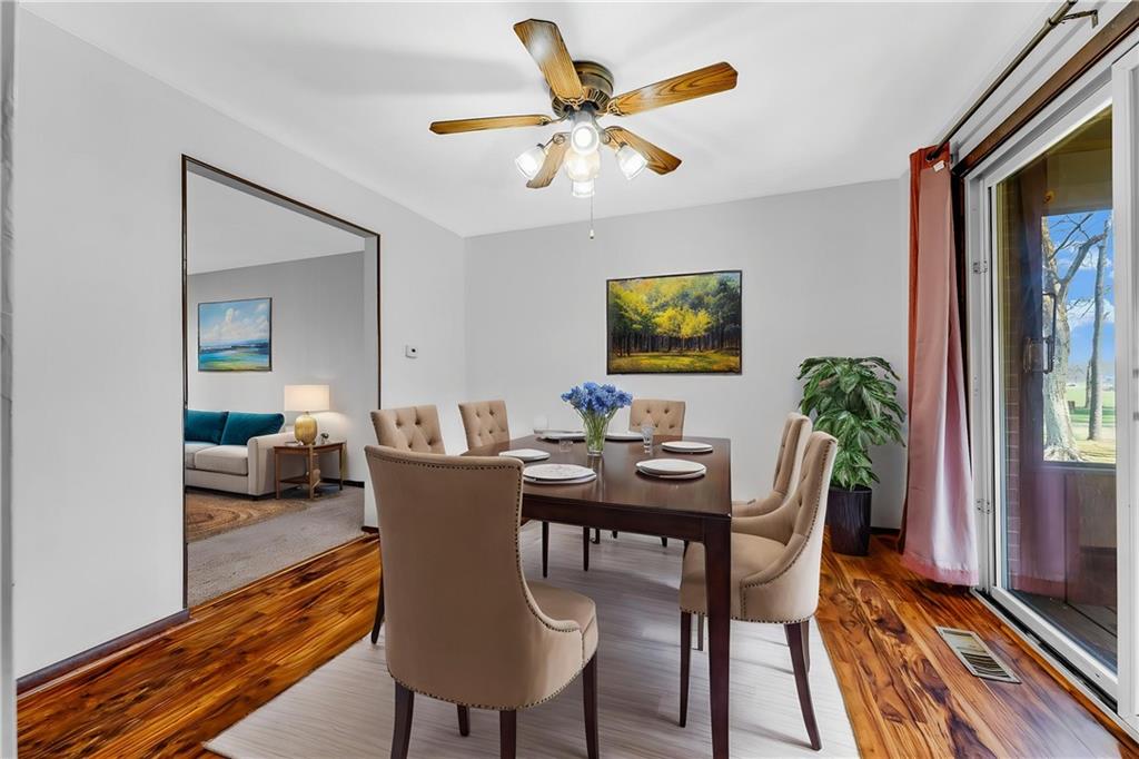 440 Steiner Bridge Road Valencia, PA 16059 - Photo 18 of 45 a view of a dining room with furniture and wooden floor
